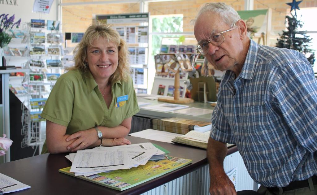 Warwick Visitor Information Centre supervisor Charee Aspinall with local visitor Brian McDonagh. 
